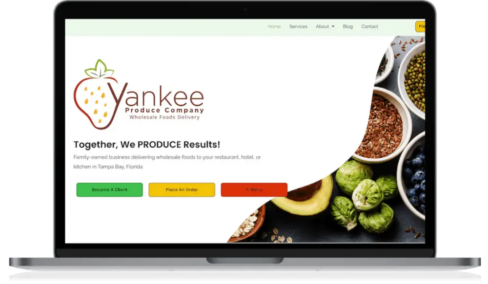 Laptop displaying Yankee Produce Company website homepage.